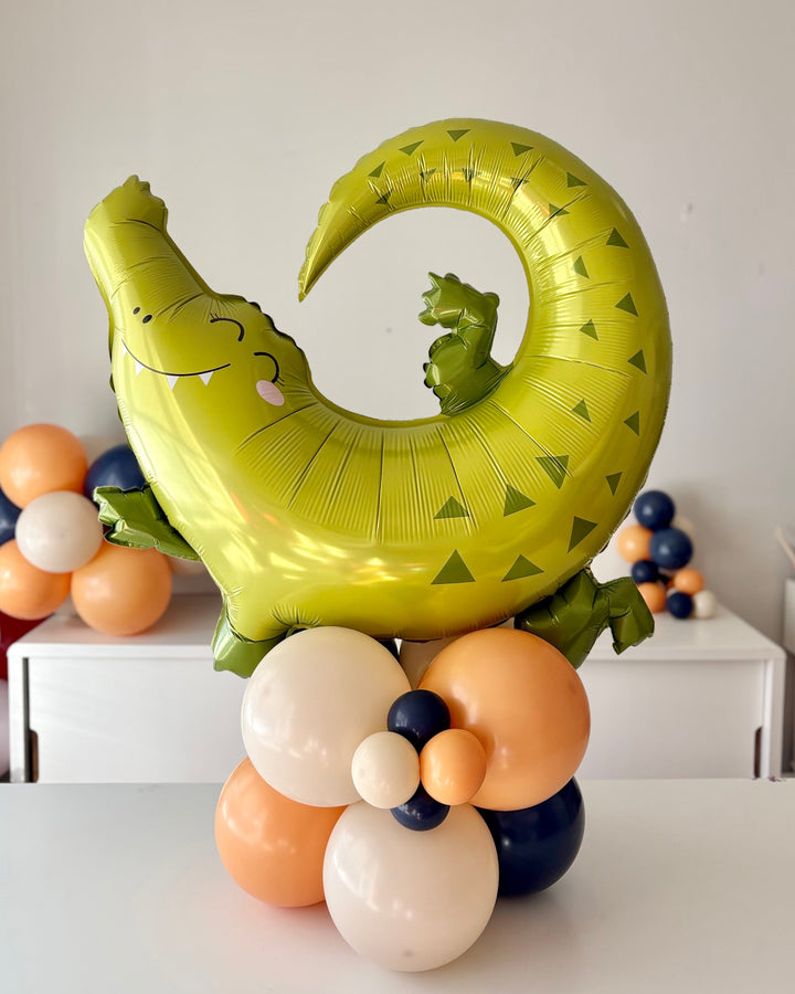 alligator column on a table in a room