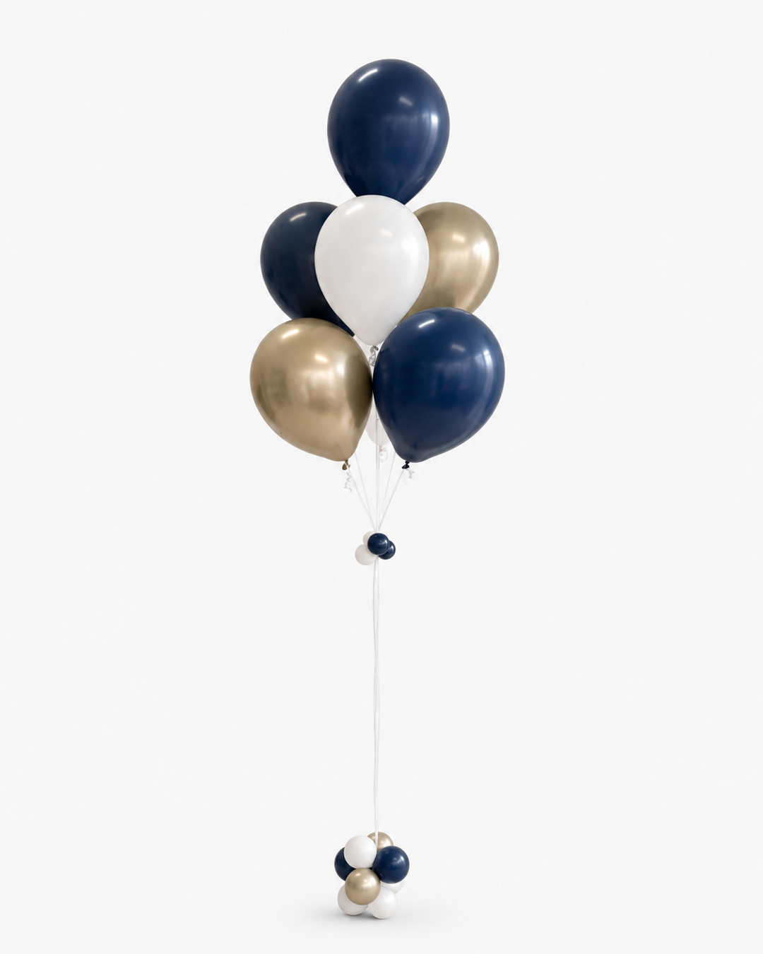 Bouquet of navy, gold, and white helium  balloons on a white background