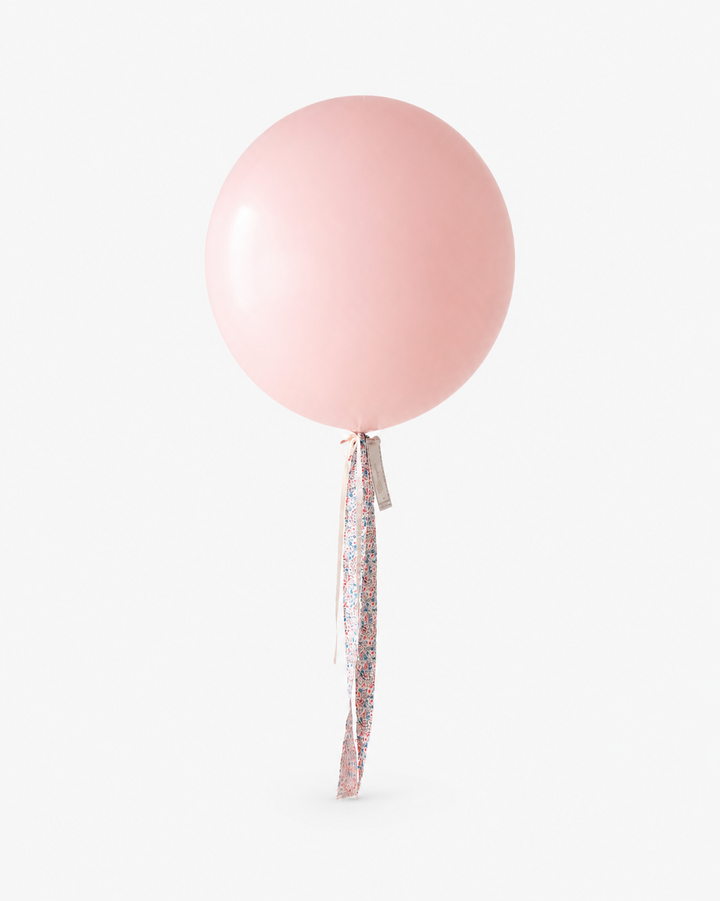 pink jumbo balloon with floral fabric tail and card with a sitting goose