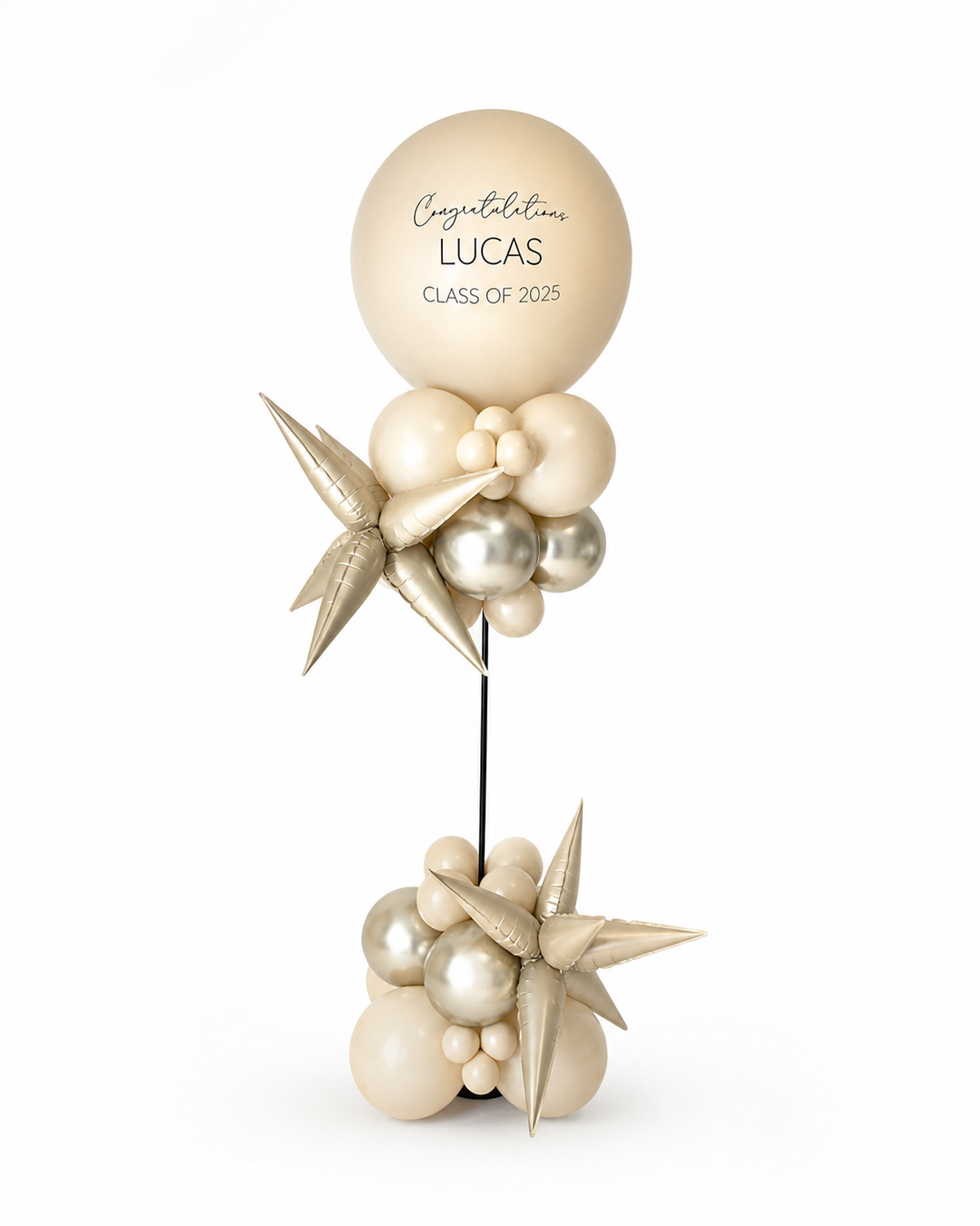 balloon column with beige jumbo balloon on top, custom text,  and star-shaped accents