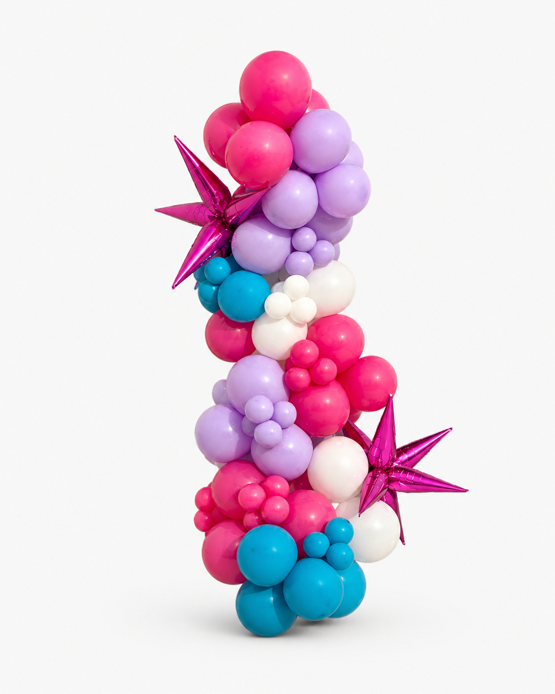 Hot pink, lilac, white, and turquoise balloon garland with star-shaped foil accents