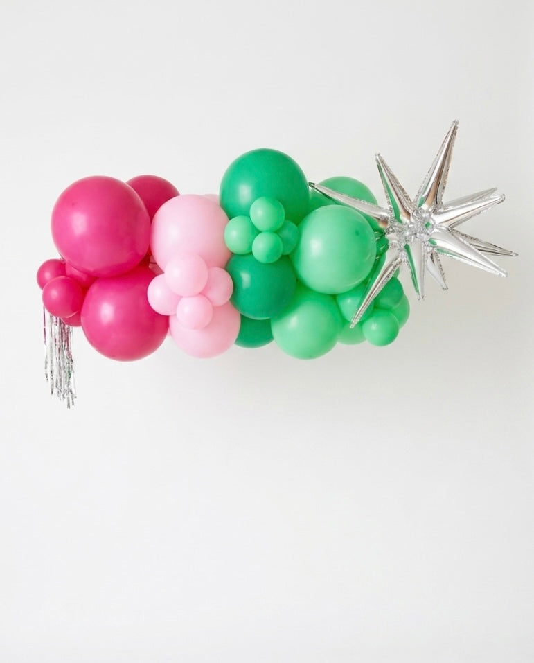 colourful garland with silver accents on white background