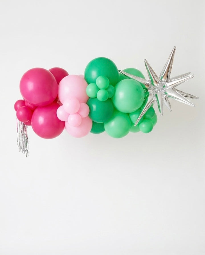 colourful garland with silver accents on white background