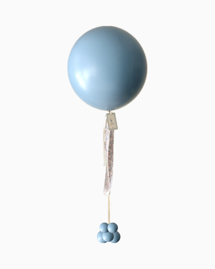 Blue jumbo balloon product showing full height and mini balloon weight