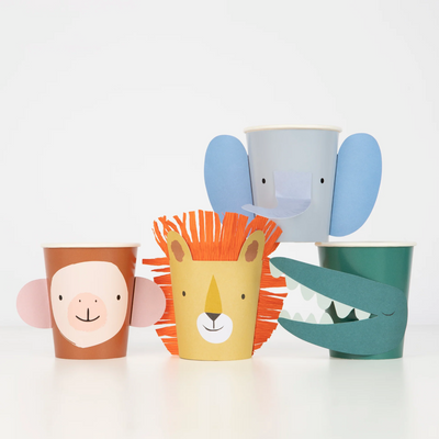 set of four paper cups with different animals, monkey with pink ears, lion with orange mane, blue elephant with ears, and green crocodile. 