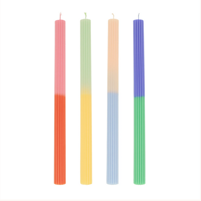 colour block candles 11' high, Two colors of wax per candle. Colors are pink and red, mint and yellow, peach and light blue, dark blue and green Colored wicks, which match the top colour of each candle