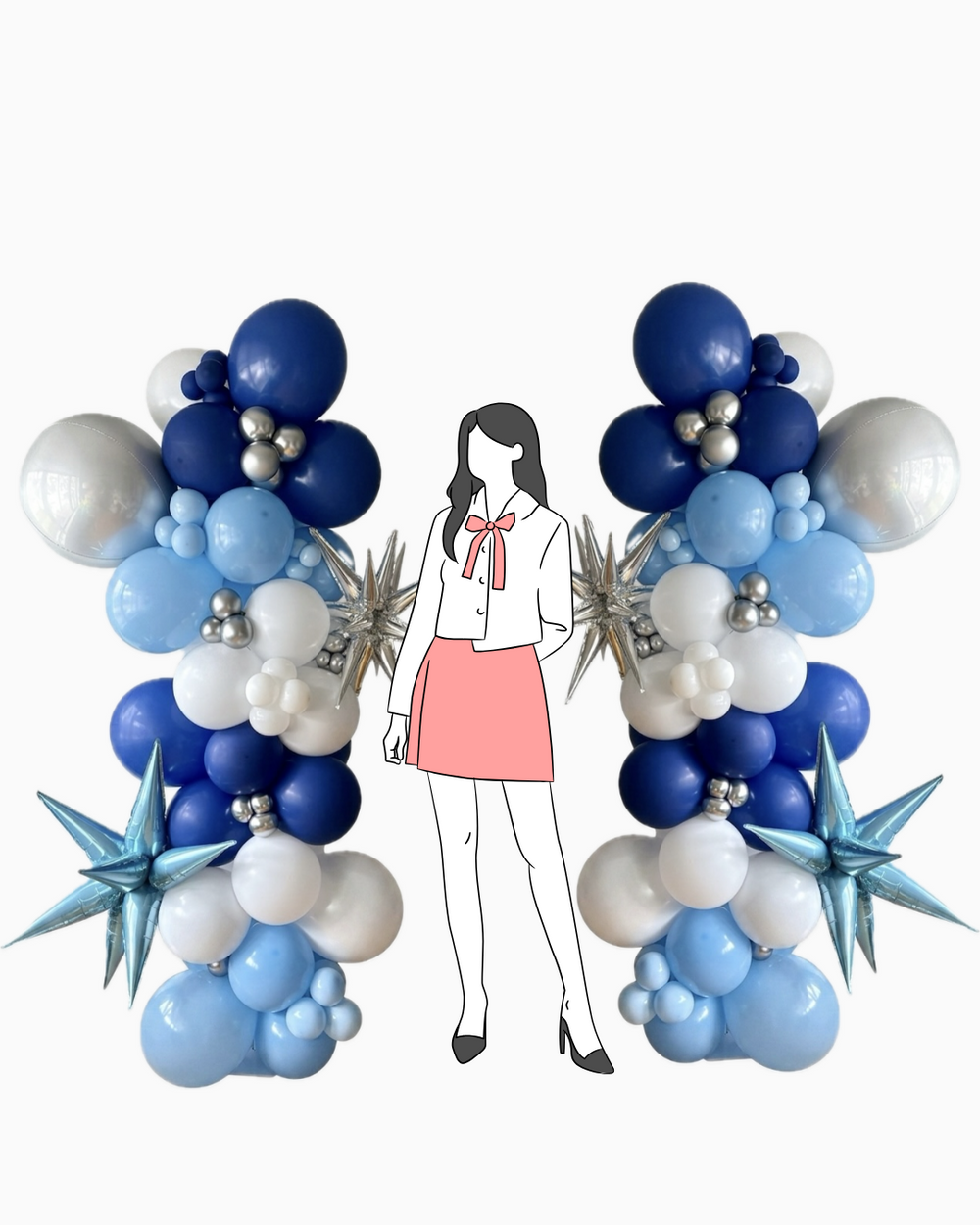 pair of organic balloon column arrangement with metallic star shaped 3D balloons starbursts and orbz (sphere) balloon and a female figure to show the height of the coumns relative to an average height  female person on a light grey background, the columns about one balloon height above the top of her head
