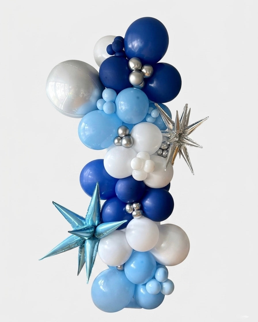 organic balloon column arrangement with metallic star shaped 3D balloons starbursts and orbz (sphere) balloon
