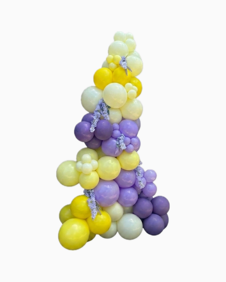 freestanding organic balloon garland on white background