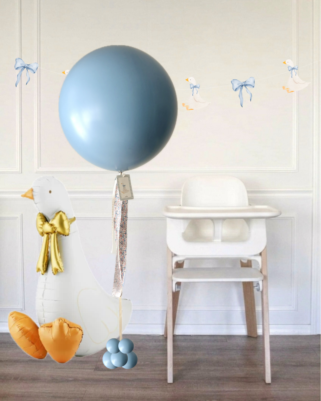 Blue jumbo balloon next to a white high chair and a goose balloon in a room