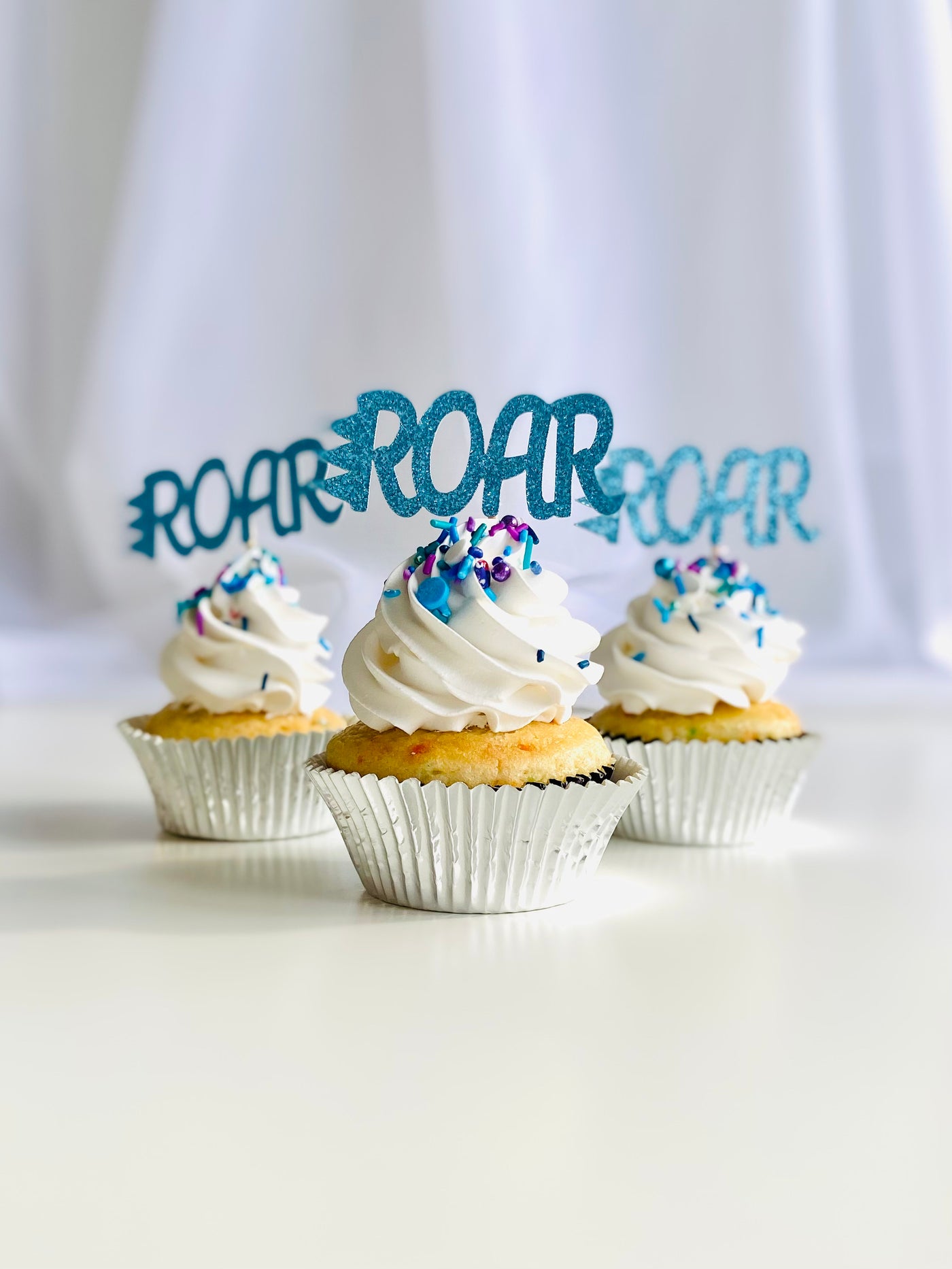 ROAR cupcake toppers, blue